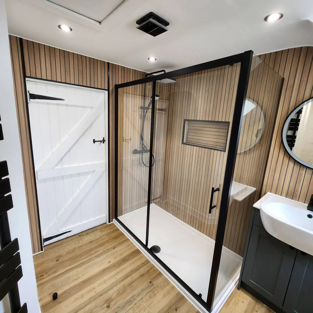 Shower installation with matt black fittings